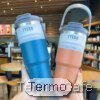 Botella de agua portátil de mano de 1 litro con diseño compacto y práctico, ideal para llevar en actividades al aire libre y mantenerse hidratado.
