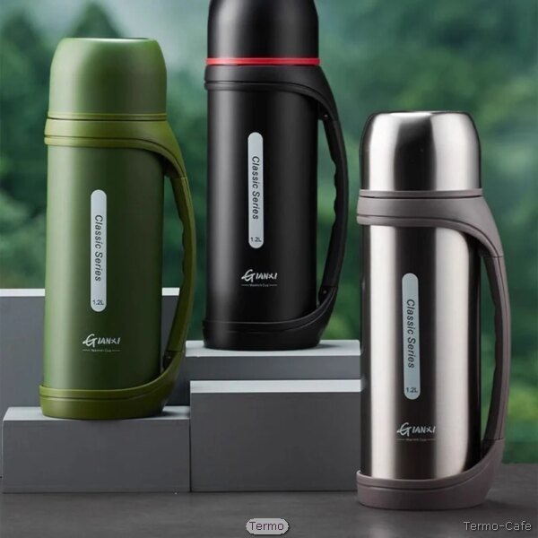 Termo hervidor térmico HANXI de 1.3L con asa ergonómica, boquilla antigoteo y tapa multifuncional tipo taza, disponible en acero, negro y verde militar.